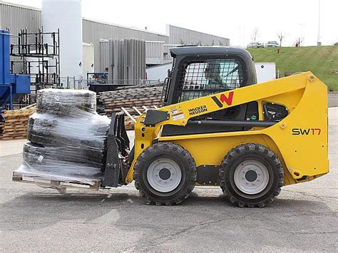 high reach skid steer|radial lift skid steer.